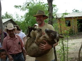 John delivers a sheep in Honduras