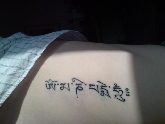  it says "Om Mani Padme Hum" which is a meditation mantra very important 