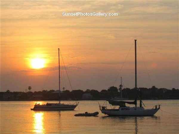 Florida St Augustine Sunrise over Harbor with Sailboats - Orange colors