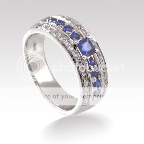 very elegant looking 14K White Gold diamond and sapphire anniversary 